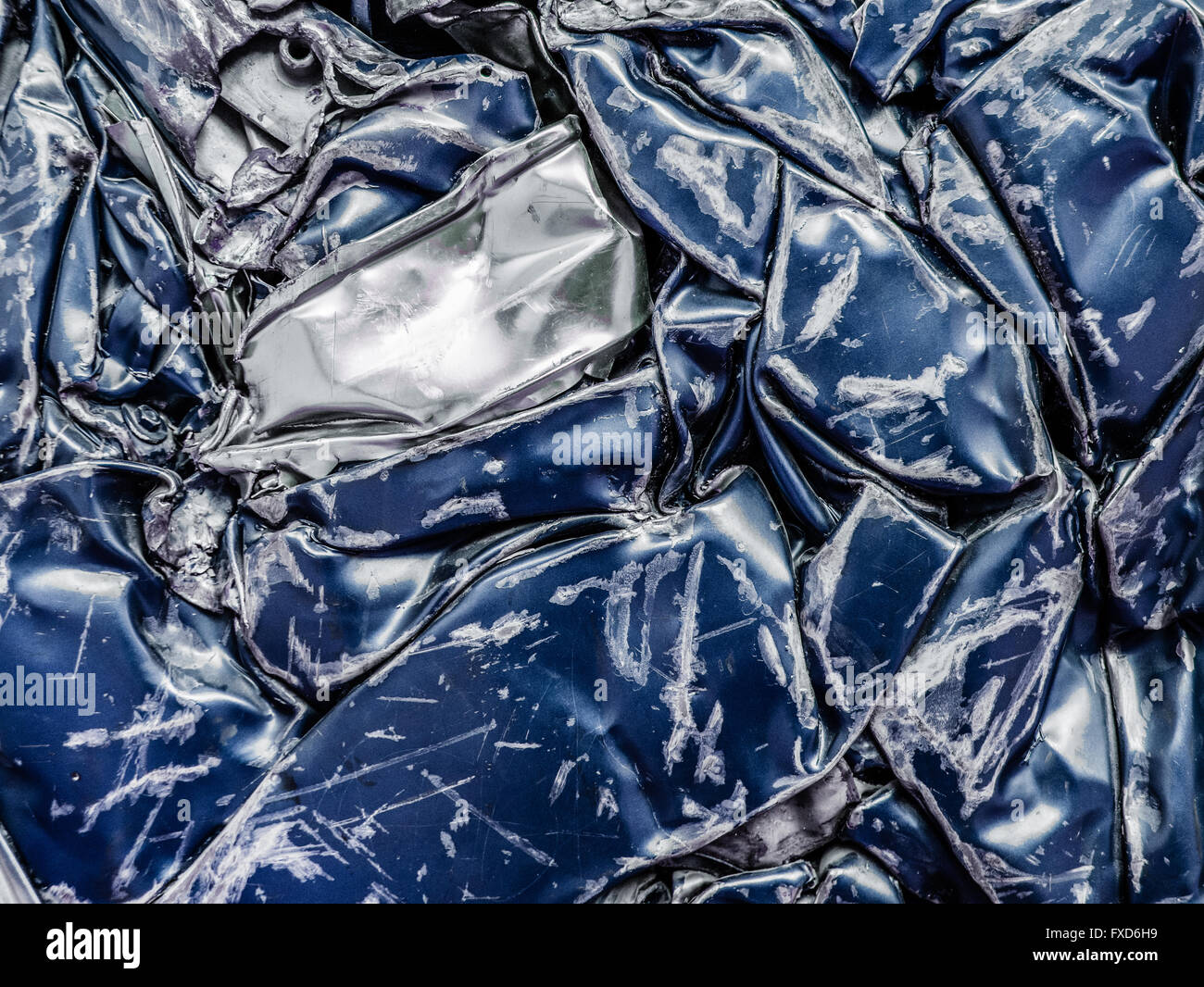 Background Texture Of Crushed Blue Steel Car Flattened In A Junkyard Stock Photo