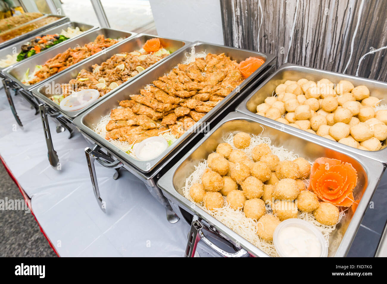 Delicious Chinese style buffet spread of Asian cuisine and snack Stock