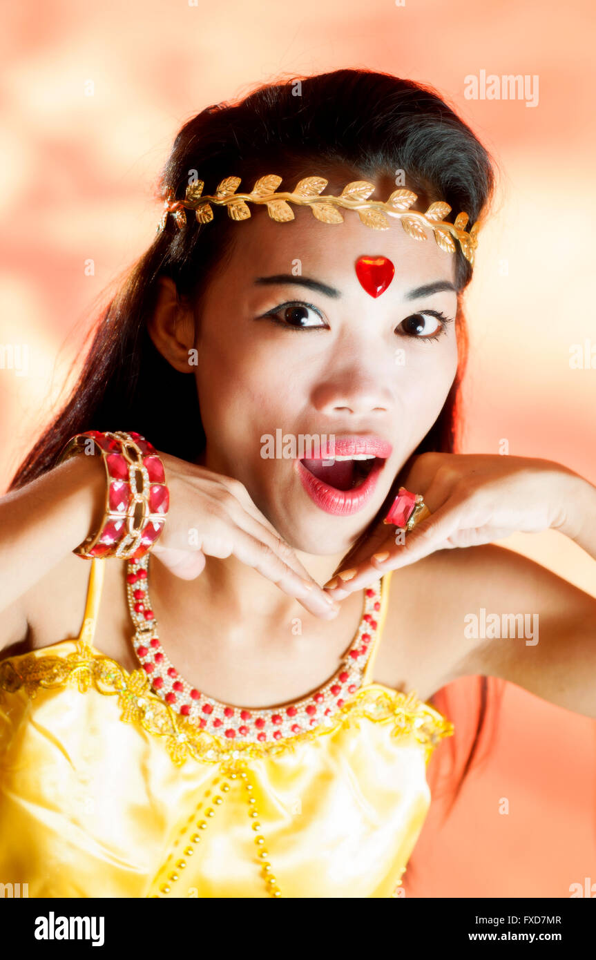 Young Asian woman as exotic dancer in studio setting Stock Photo Alamy