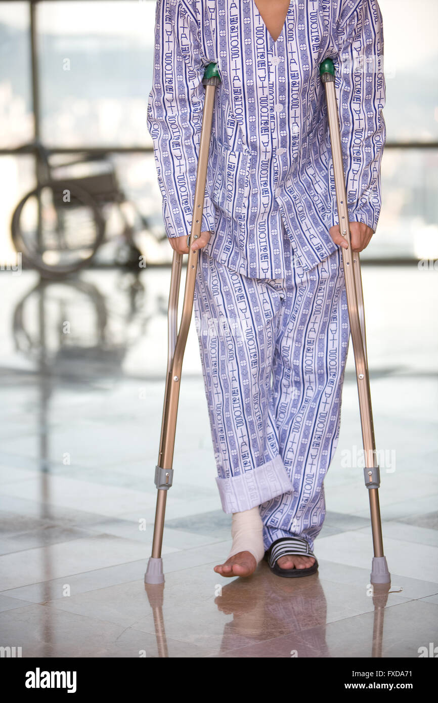 Crutches asia hires stock photography and images Alamy