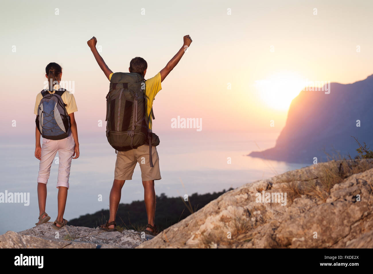 Two hikers backpack standing hi-res stock photography and images - Alamy