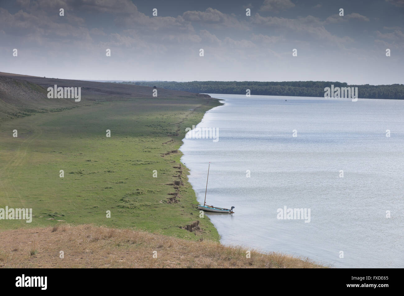 a lonely sailboat in the middle of nowhere Stock Photo
