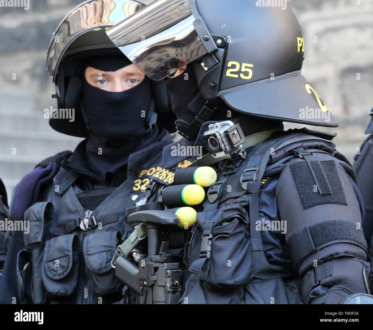 Riot police in Prague, Czech Republic, monitoring protest rally in support of Tibet that coincided with a visit by President Xi Stock Photo