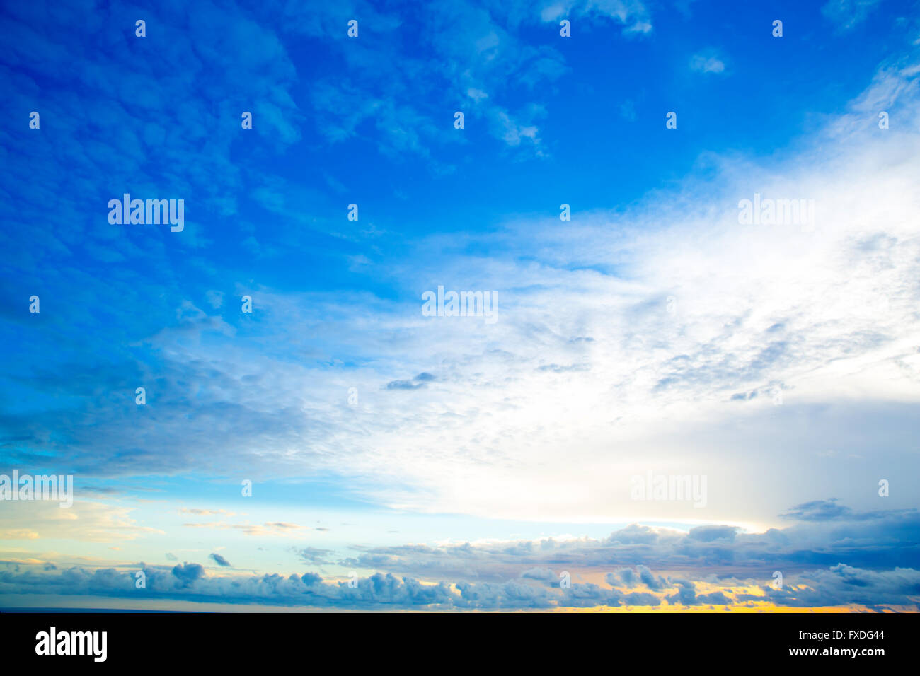 A beautiful cloudy sunset over the ocean Stock Photo - Alamy