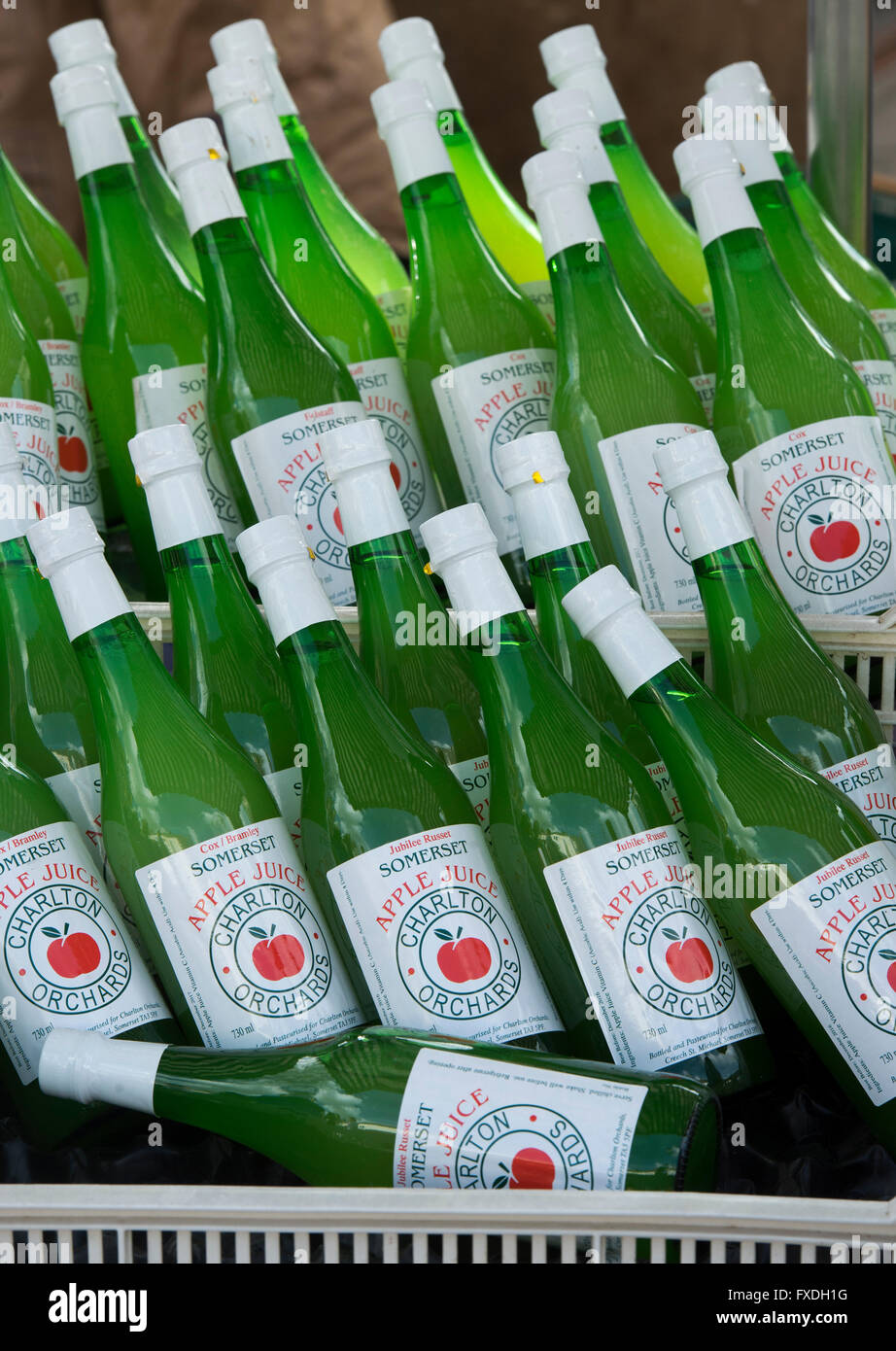 Somerset bottled apple juice on a market stall. Wells, Somerset, England Stock Photo