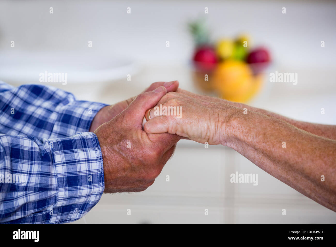 Cropped holding hands hi-res stock photography and images - Alamy