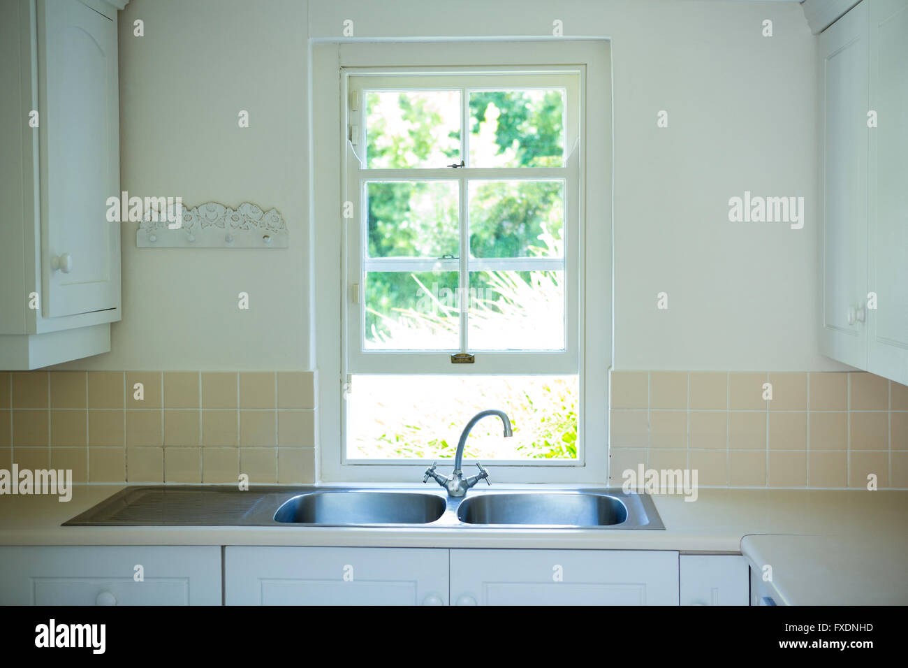 Modern kitchen with an induction chimney and cooker Stock Photo