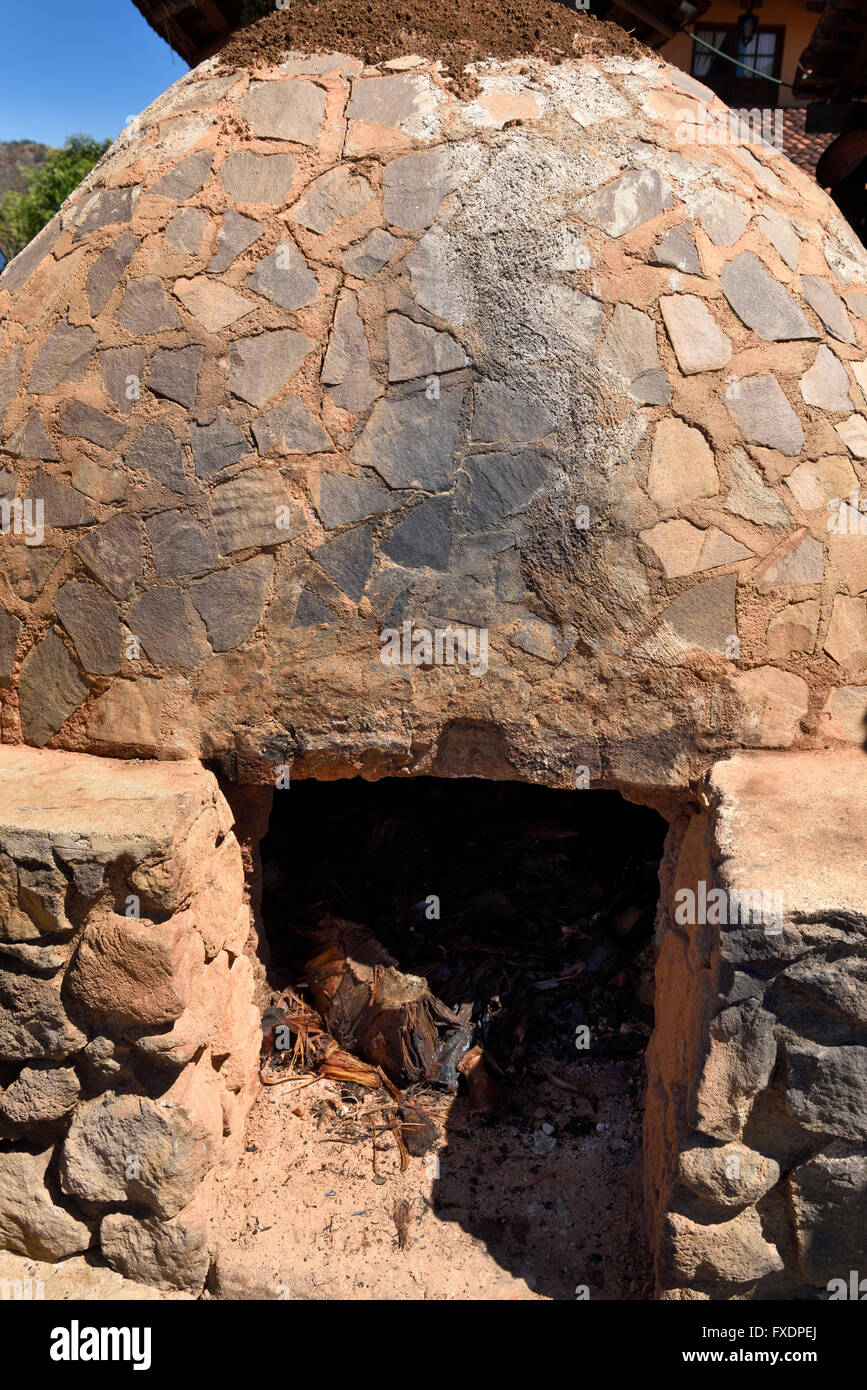 Stone beehive oven for cooking agave to make Tequila in Jalisco Mexico