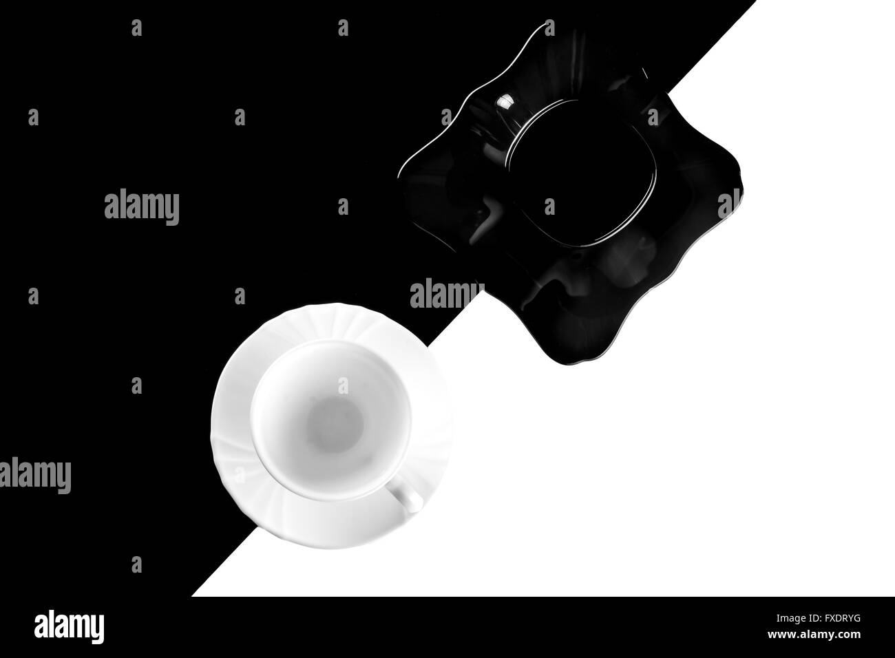 black and white coffee cups with plates Stock Photo Alamy