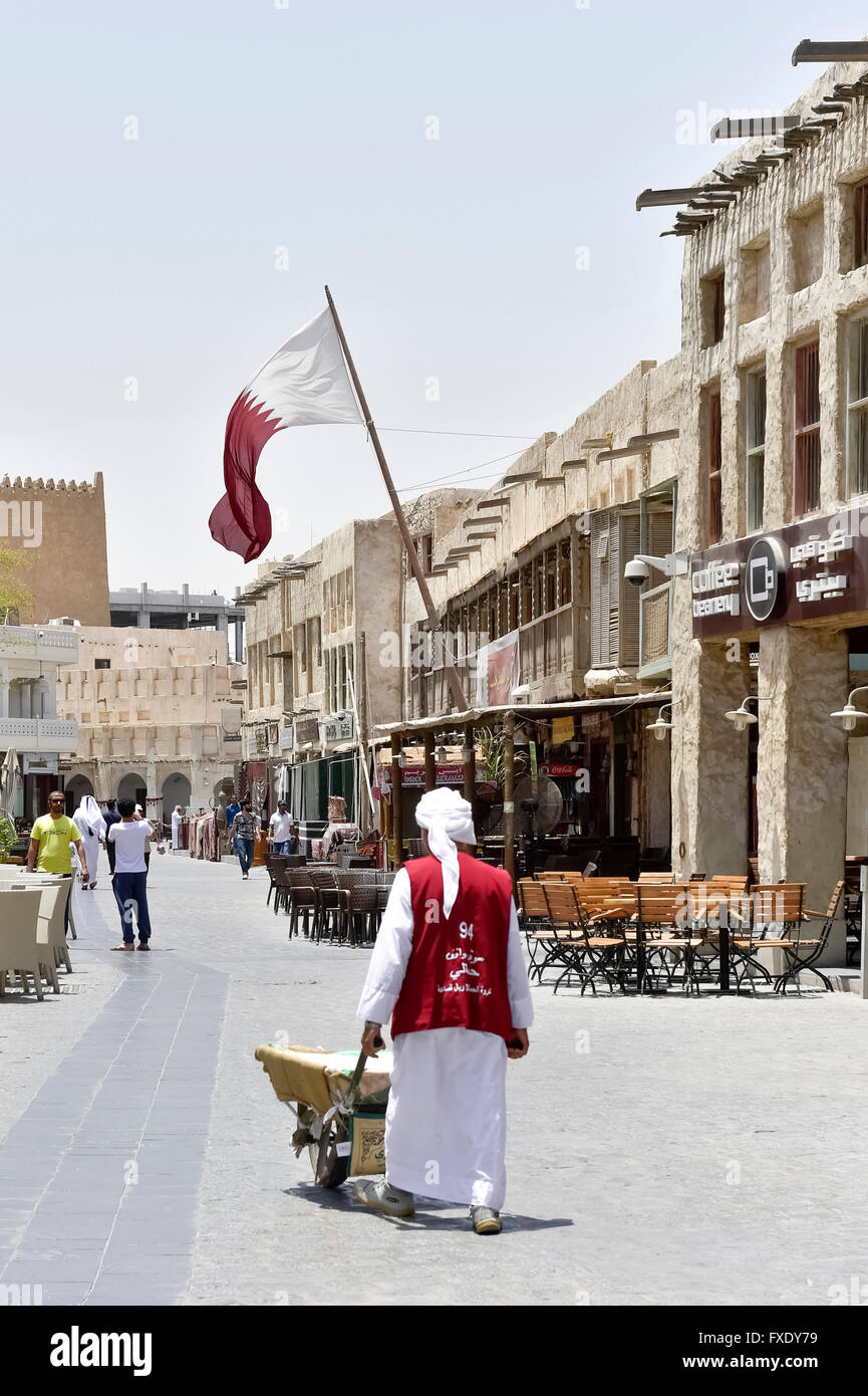 Man with Garette in the Wakif Souk or Souq Waqif, bazar, Doha, Qatar Stock Photo