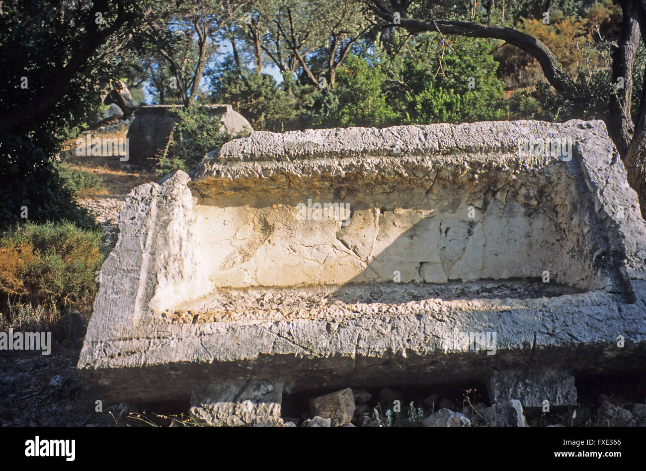 Plundered Lycian tomb in the hills of Kas, Antalya, Province, Turkey Stock Photo