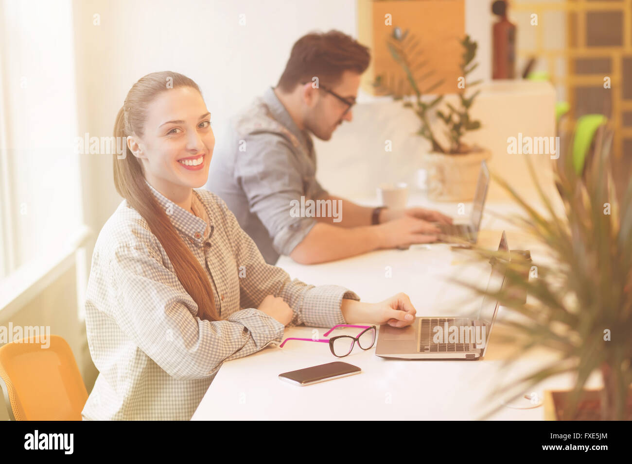 Freelance man and woman Stock Photo