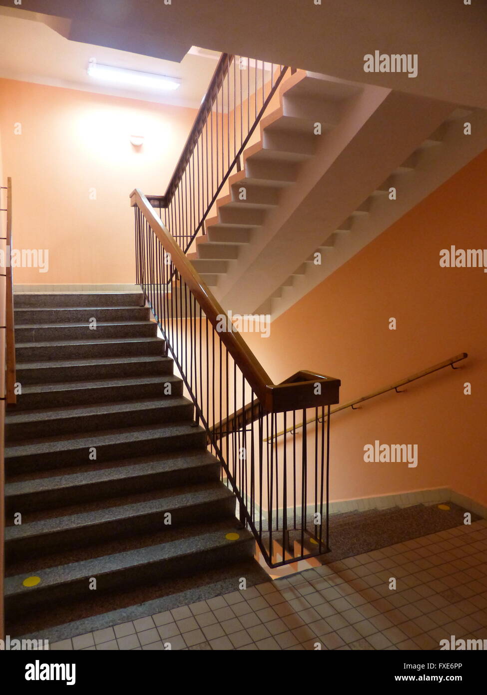 Stone hospital stairway with steel railing Stock Photo - Alamy