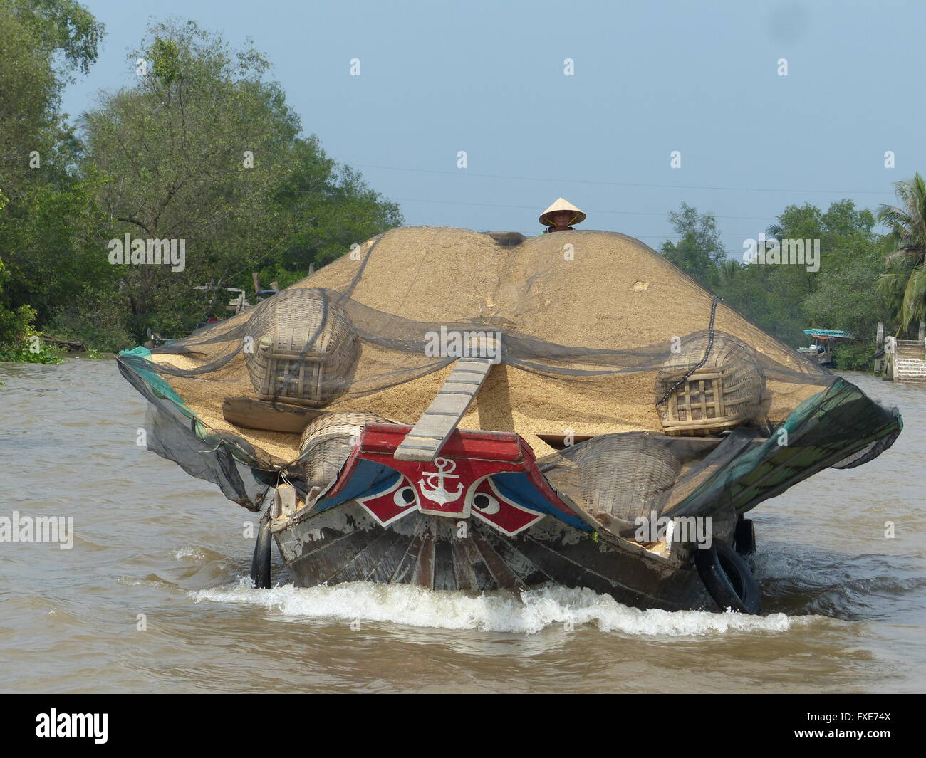 Vietnam, Mekong River Delta, river barge, rice Stock Photo