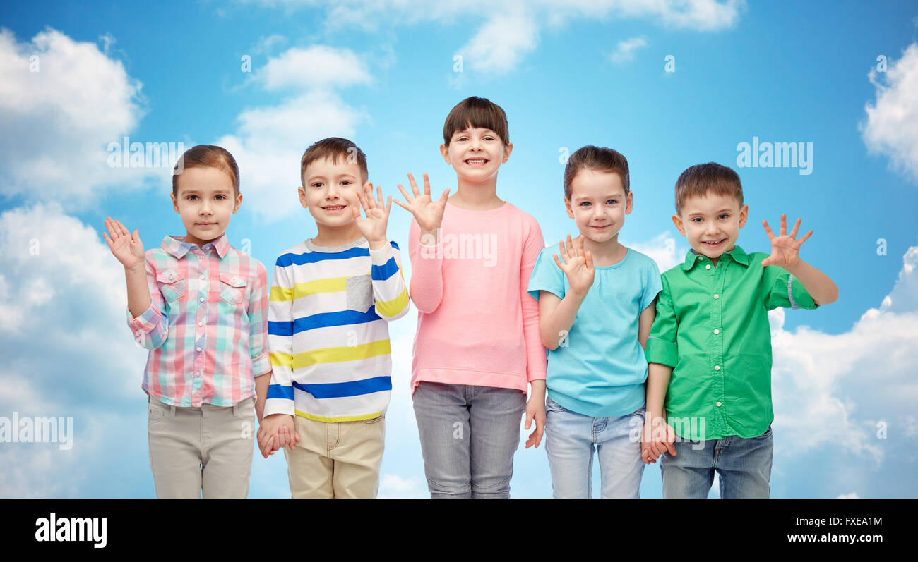 happy smiling little children holding hands Stock Photo