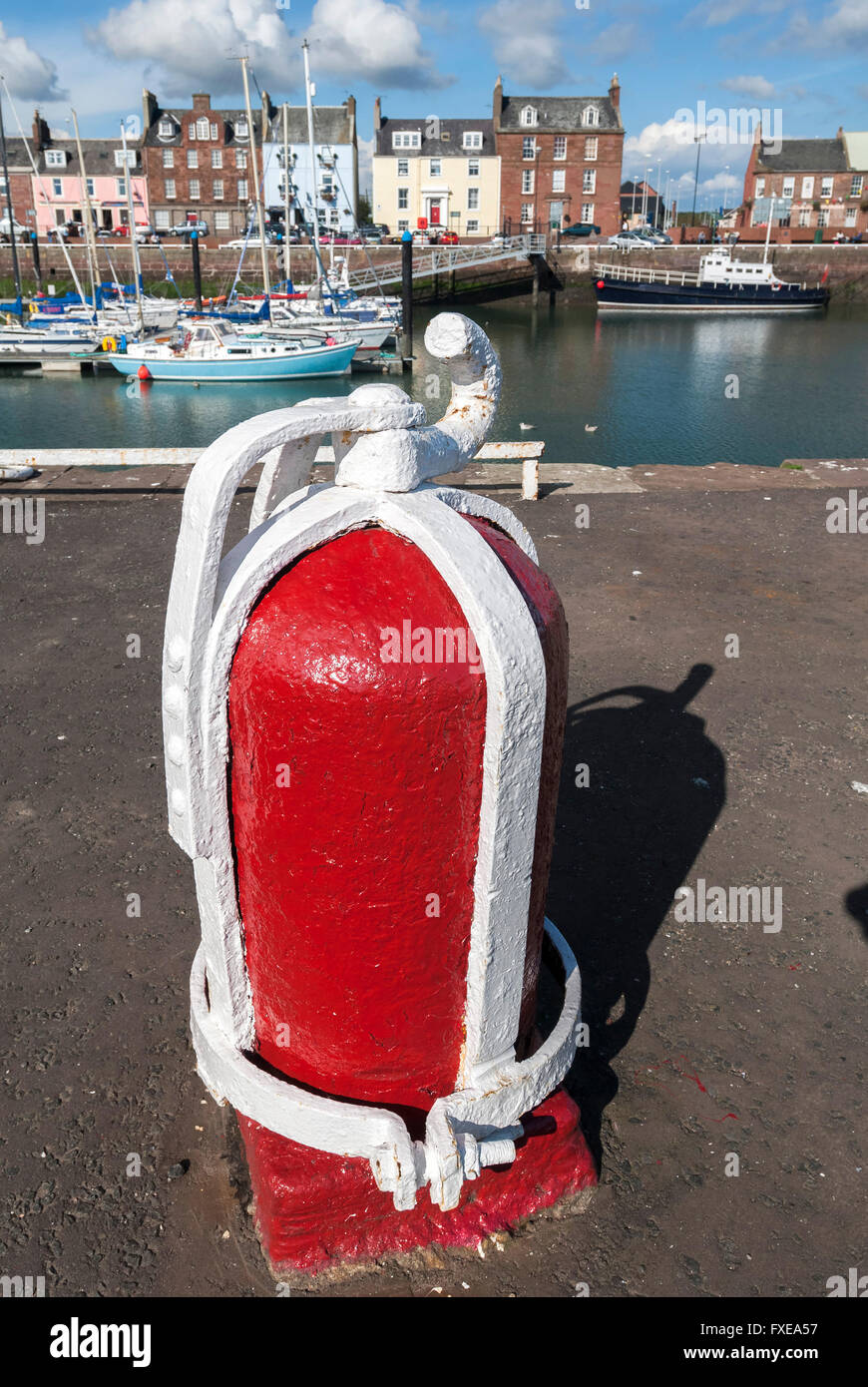 A colourful bollard for tying up boats in Arbroath harbour. Angus. Scotland. Stock Photo