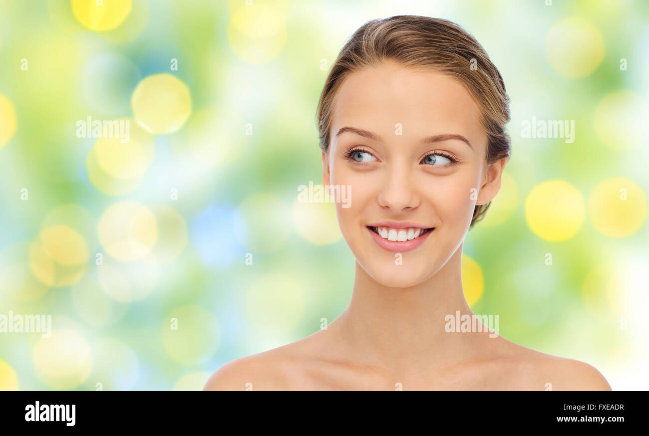 smiling young woman face and shoulders Stock Photo - Alamy