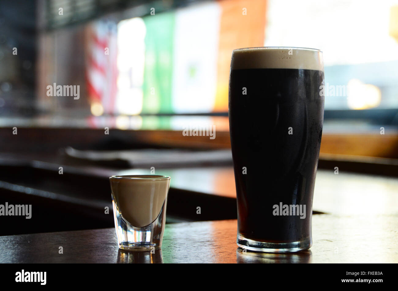 Drink known as a Irish Car Bomb guinness or stout with Bailey's on a