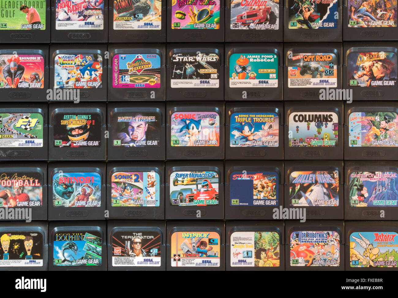 Sega Game Gear videogame cartridges from the 1990s, including Sonic the Hedgehog, Columns, Super Monaco GP, OutRun and Star Wars Stock Photo