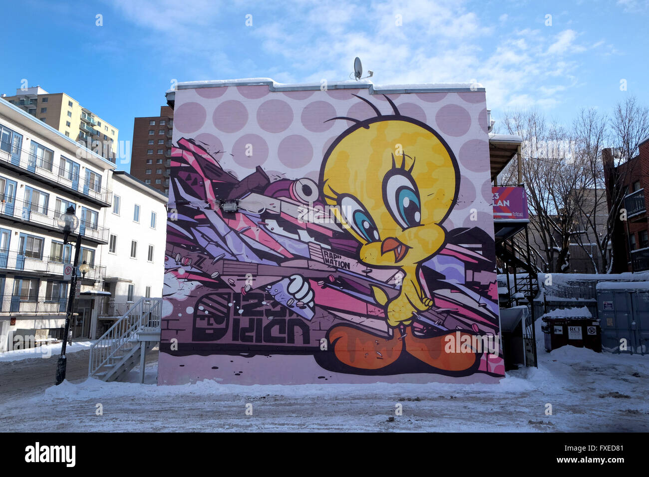 Street art or graffiti seen on the side of a building in Montreal in Canada. Stock Photo