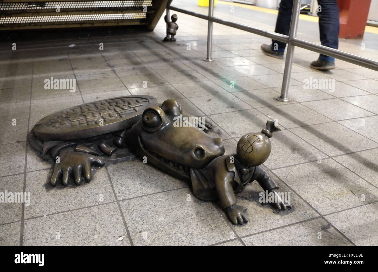 A bronze art installation of a crocodile located in 14th Street Station in New York City, United States of America. Stock Photo