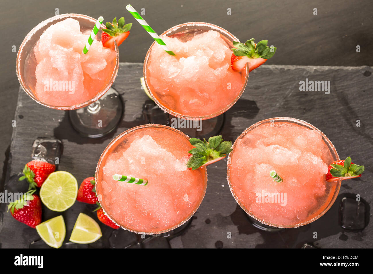 Frozen strawberry margarita cocktail in margarita glass Stock Photo Alamy