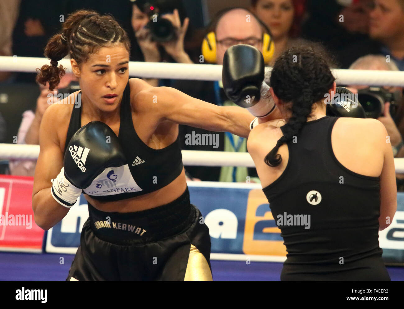 Ladies boxing between Ikram Kerwat (Germany) and Gina Chamie (Hungary) for the vacant WBC lightweight title, Potsdam, Germany, April 2016 Stock Photo
