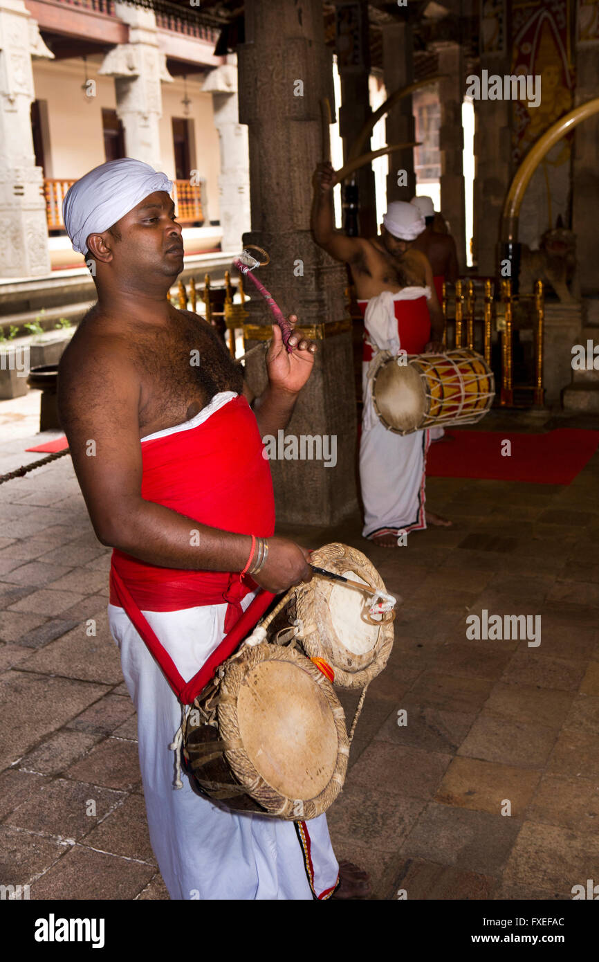 Sri Lanka, Kandy, Temple of the Tooth Relic, drummers creating beat for morning puja Stock Photo