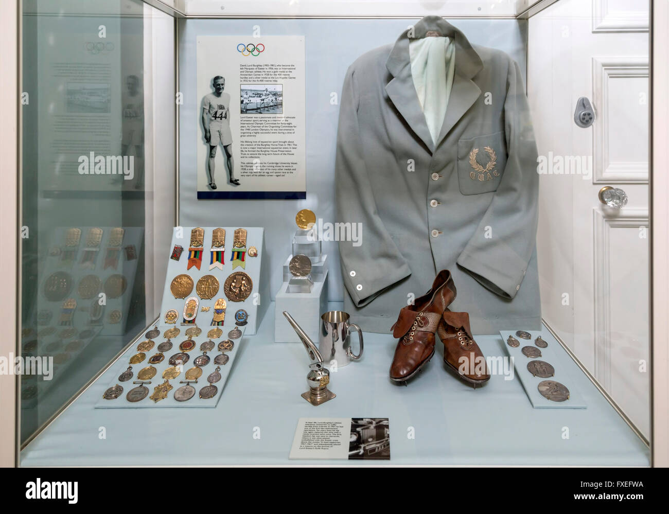 Glass case at Burghley House, showing David Burghley, who won the gold medal in the 400 m hurdles at the 1928 Summer Olympics. Stock Photo