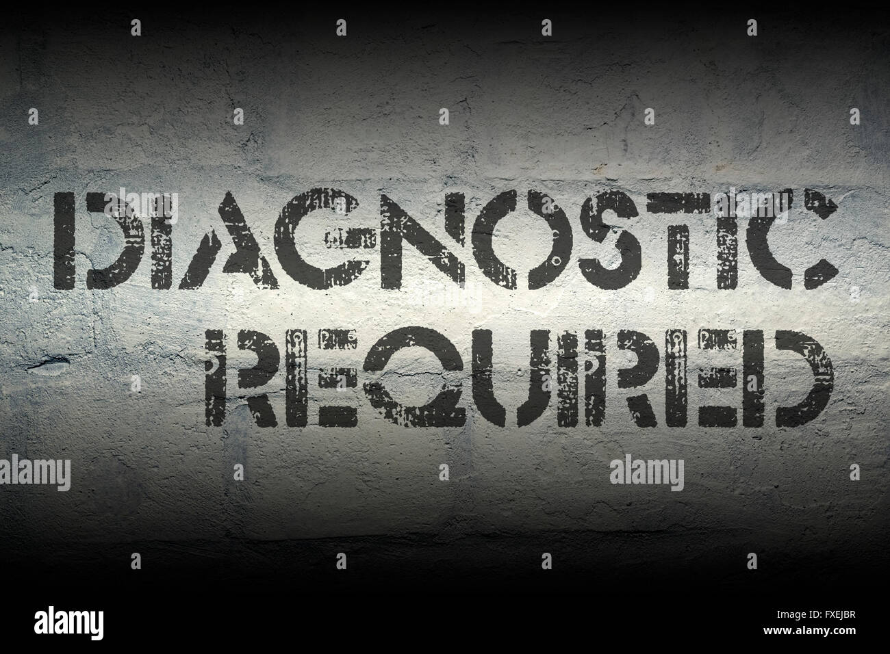 diagnostic required stencil print on the grunge white brick wall Stock Photo