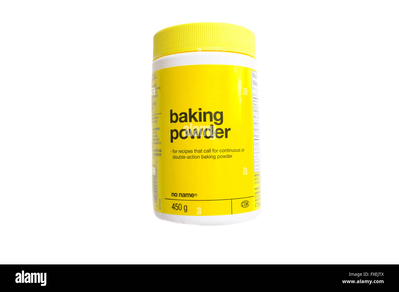 A bottle of baking powder photographed against a white background Stock