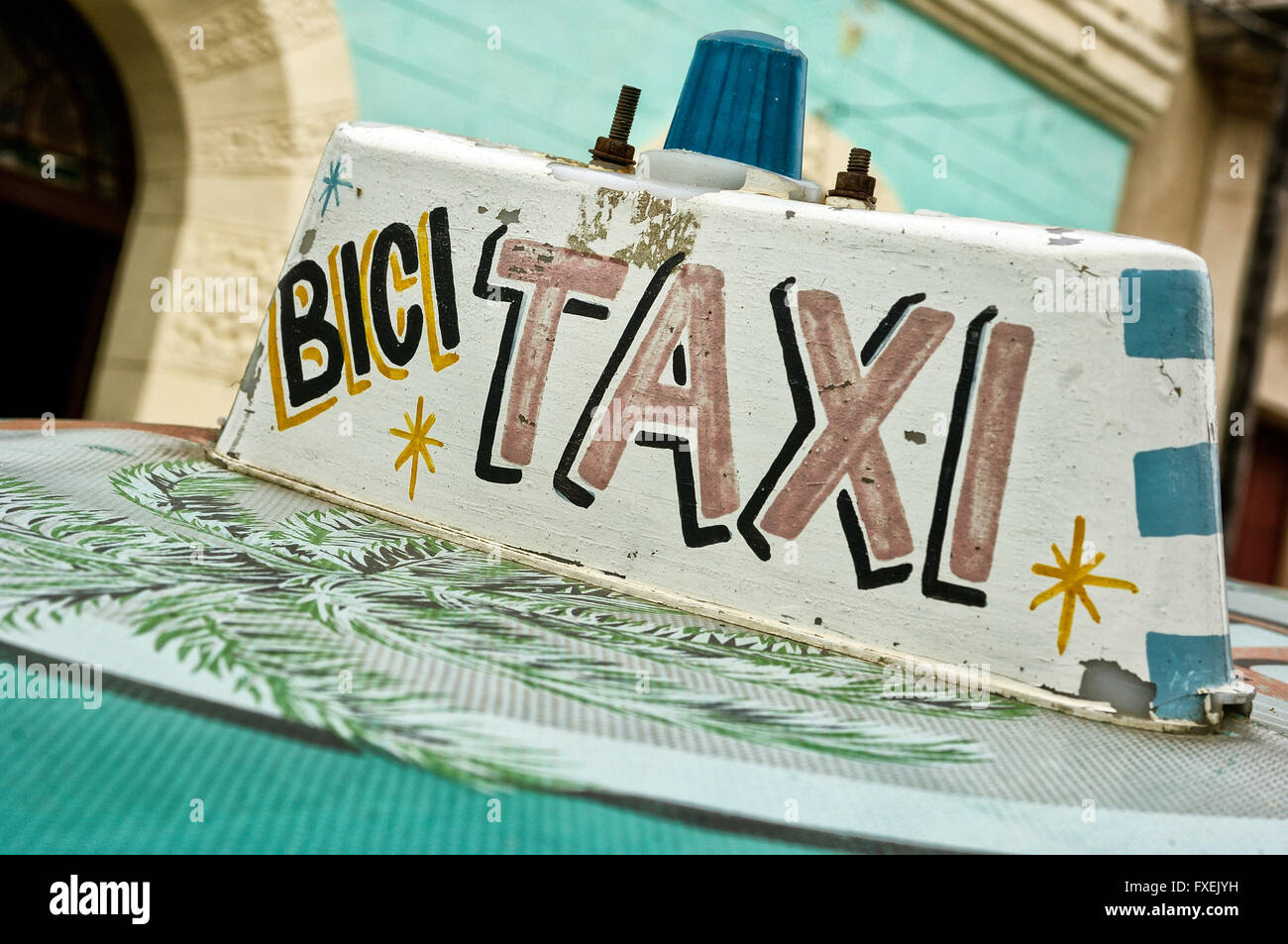 Bici taxi cab roof sign. Cuba Stock Photo