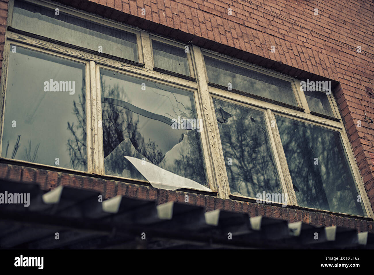 broken glass window reflecting clounding sky Stock Photo - Alamy