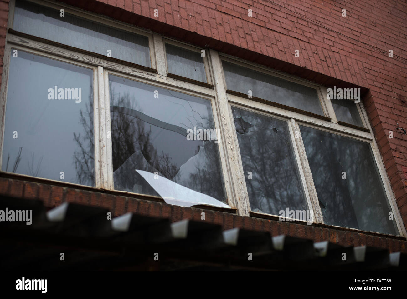 broken glass window reflecting clounding sky Stock Photo - Alamy