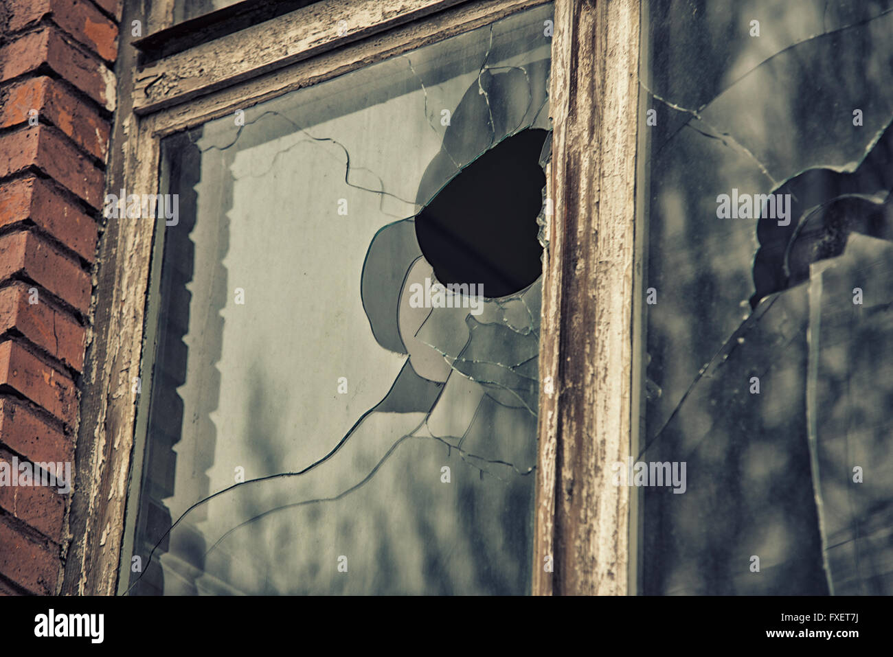 broken glass window reflecting clounding sky Stock Photo - Alamy