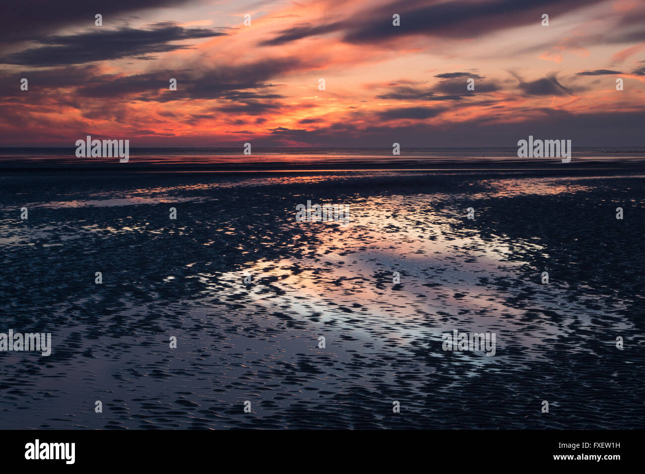 Wallasey beach at sunset Stock Photo