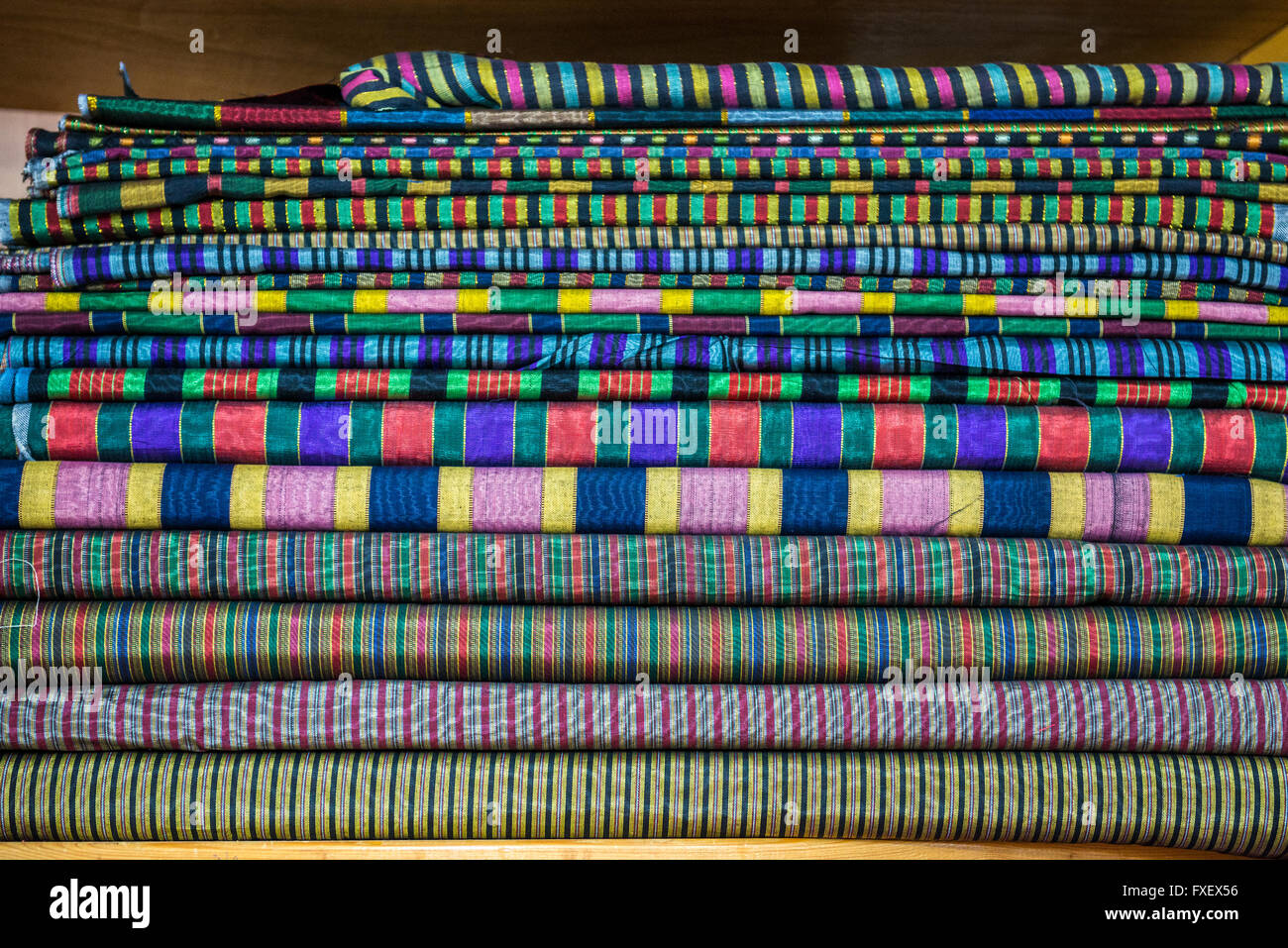 Heap of fabrics in Bilal Abu Khalaf, dealer of imported orient fabrics