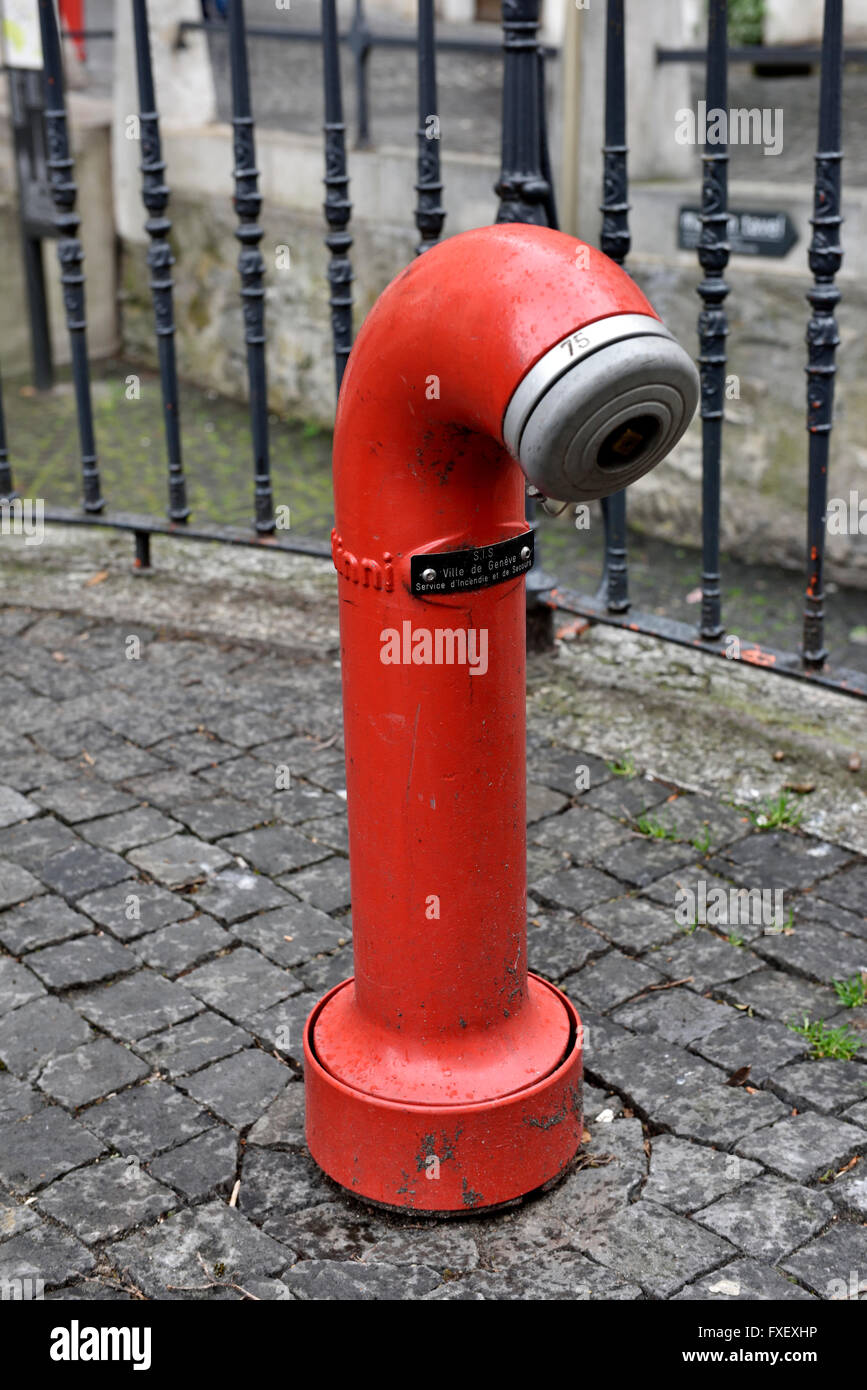 Swiss pattern red fire hydrant Stock Photo