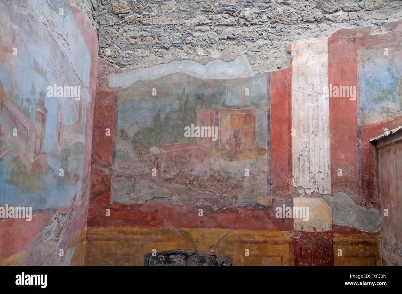 Colorful wall painting decoration elegant villa in archaeological site of Pompeii Italy Stock Photo