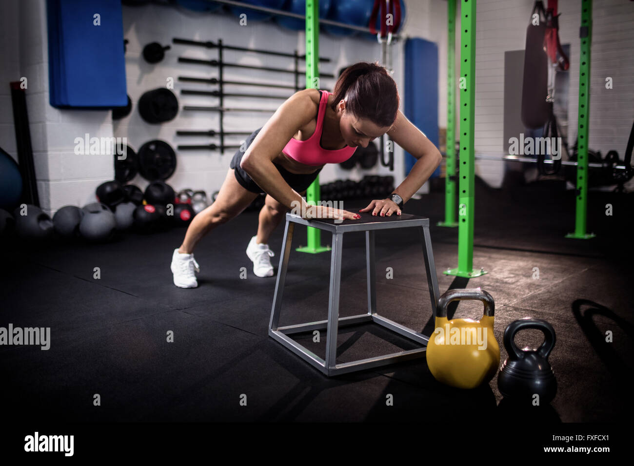 Woman doing push ups Stock Photo - Alamy