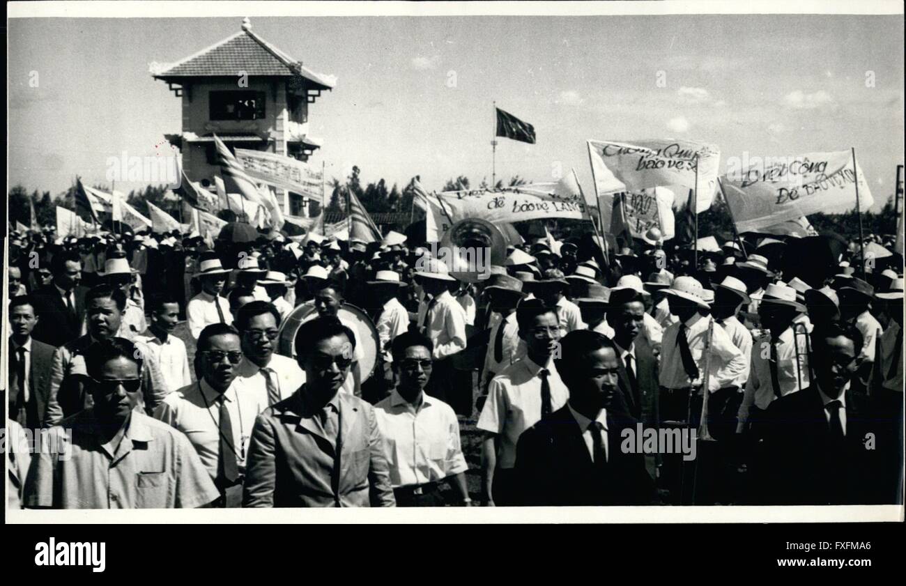 1967 - South Vietnamese citizens demonstrated in the demilitarized zone south of the 17th parallel separting North and South Vietnam for the reunification of the country. In the background files the North Vietnamese communist flag. © Keystone Pictures USA/ZUMAPRESS.com/Alamy Live News Stock Photo
