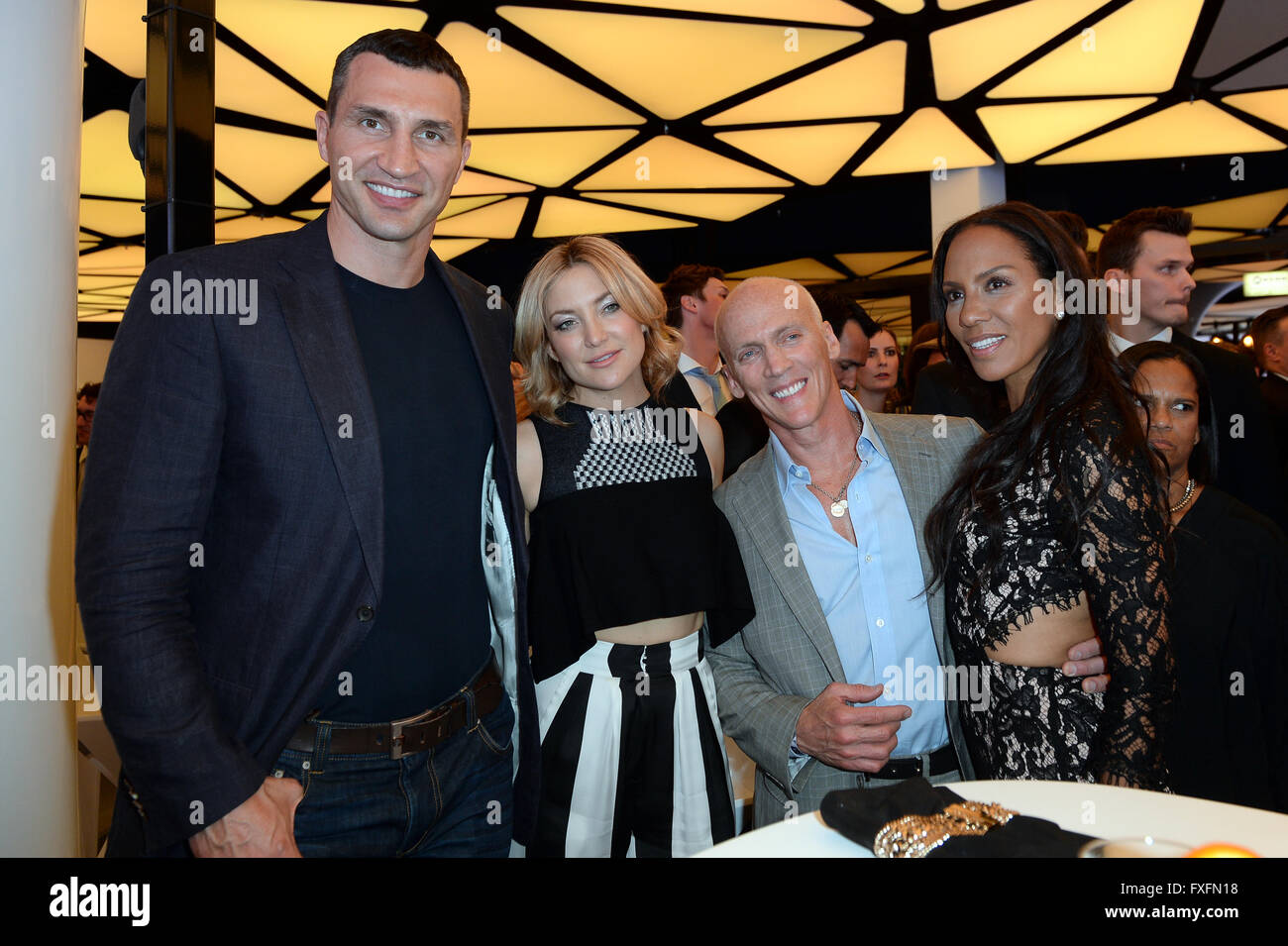 Berlin, Germany. 14th Apr, 2016. Boxing pro Wladimir Klitschko (L-R), US actress Kate Hudson, US fitness coach David Kirsch and German fitness coach Barbara Becker attend the opening party of the fitness studio 'World of Cyberobics' in Berlin, Germany, 14 April 2016. The fitness arena will open on 18 April 2016. Photo: Britta Pedersen/dpa/Alamy Live News Stock Photo