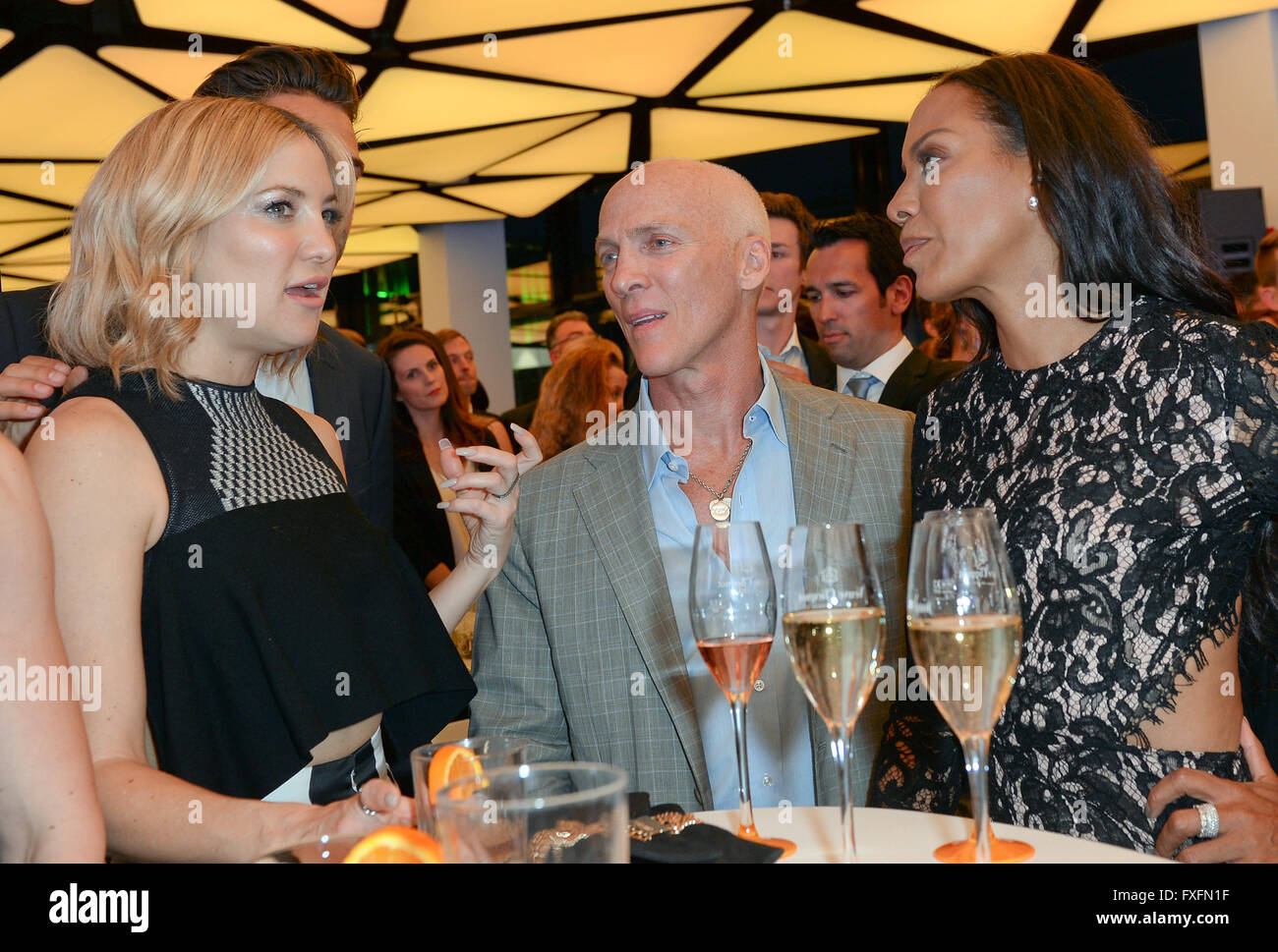 Berlin, Germany. 14th Apr, 2016. US actress Kate Hudson (L-R), US fitness coach David Kirsch and German fitness coach Barbara Becker attend the opening party of the fitness studio 'World of Cyberobics' in Berlin, Germany, 14 April 2016. The fitness arena will open on 18 April 2016. Photo: Britta Pedersen/dpa/Alamy Live News Stock Photo