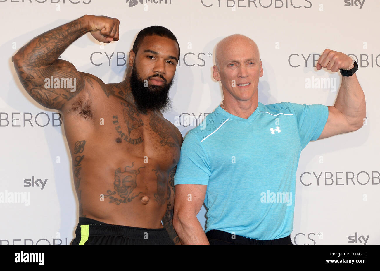 Berlin, Germany. 14th Apr, 2016. US fitness coachr James (the Beast) Wilson (L) and US fitness coach David Kirsch pose during the opening of the fitness studio 'World of Cyberobics' in Berlin, Germany, 14 April 2016. The fitness arena will open on 18 April 2016. Photo: Britta Pedersen/dpa/Alamy Live News Stock Photo