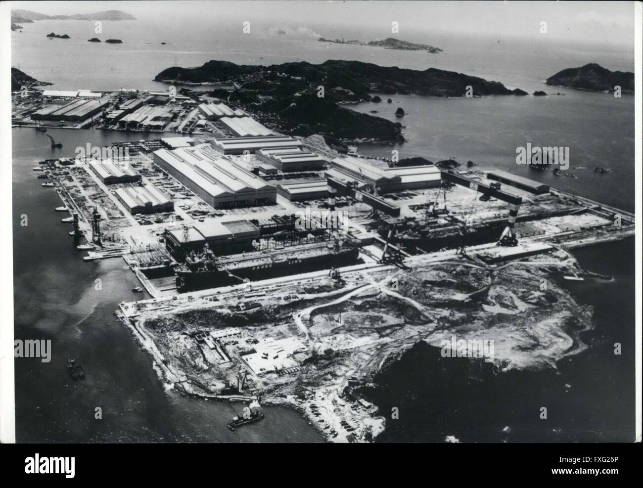 1956 - Japan Opens World's Biggest Shipyard. The world's largest shipyard, which can build three mammoth tankers at the same time, was opened this week at Nagasaki, Japan by Mitsubishi Heavy Industries. The one-miIiion-ton facility cost 40,000 million Yen (&pound;50 million)., and is 990 meters in length, 100-meters in width, and has two 600-ton gantry cranes. The company will have 10 vessels to build this year in the 260,000-class. Next year a repair dock will be added to take ships up to 500,000-ton. Photo: An aerial view of the world's biggest shipyard at Nagasaki, Japan. (Credit Image: © K Stock Photo