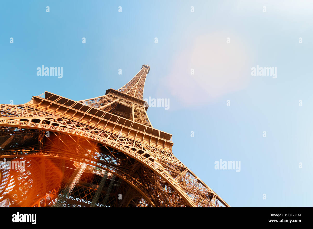 Eiffel Tower with lens flare and copy space. Stock Photo