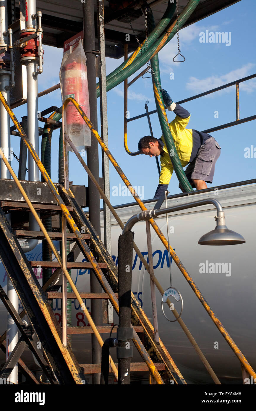 Petroleum worker fills his taker at North Coast Petroleum depot in