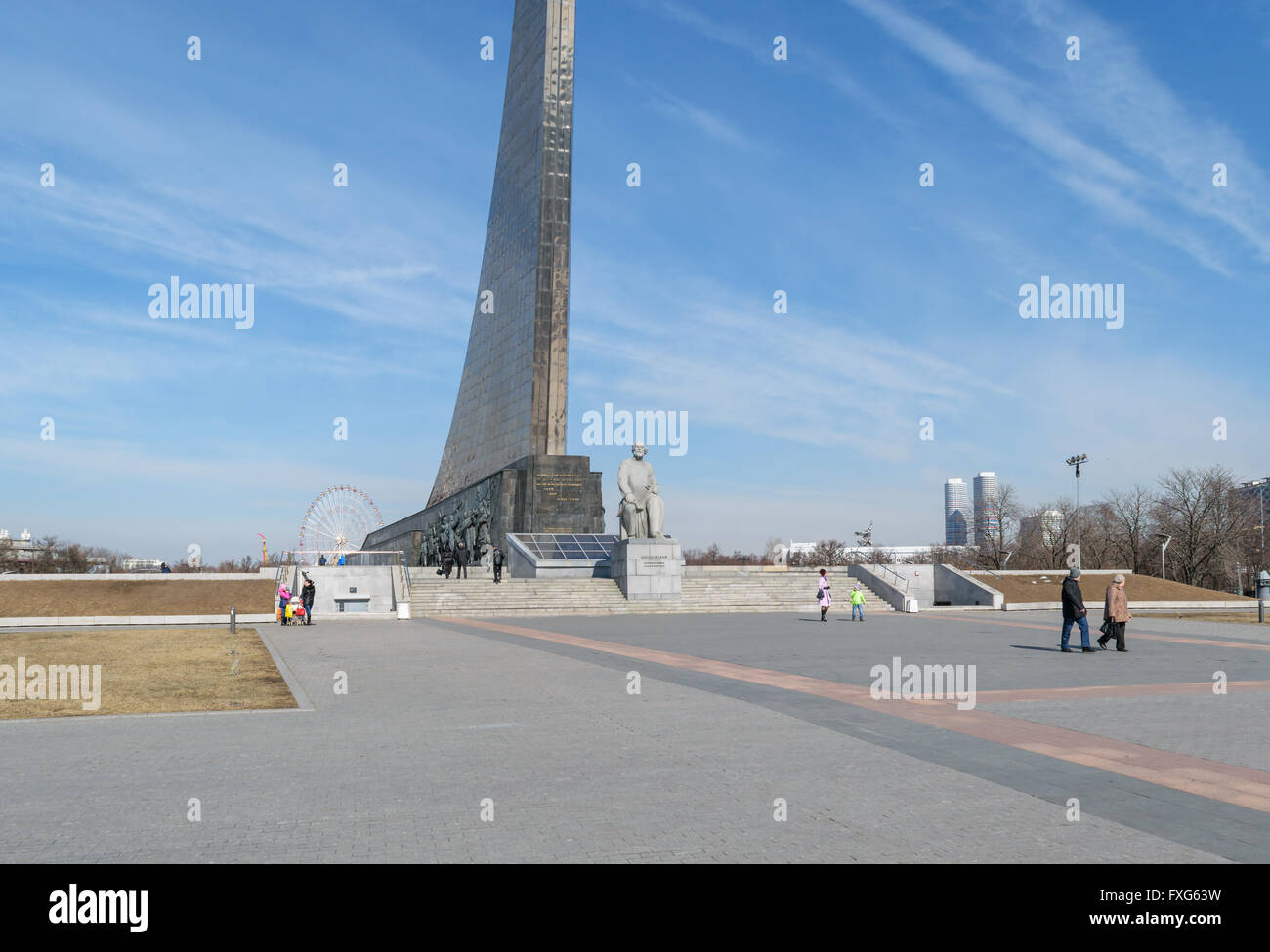 Moscow, Russia - March 29, 2016: People near the monument to the founder of astronautics Tsiolkovsky near the entrance to VDNH Stock Photo