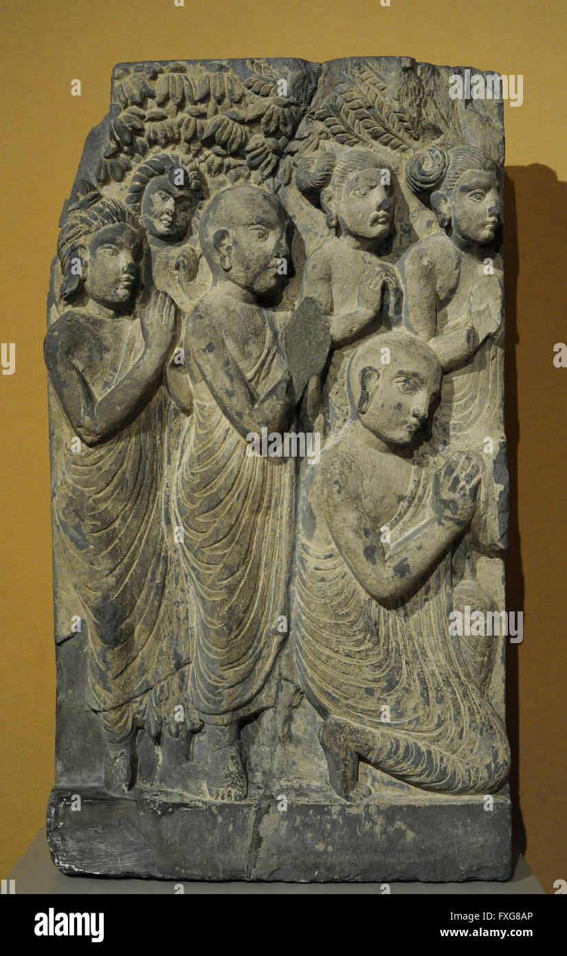 Asian Art. Monks and laymen from a scene of the Buddha sermon. Slate. Gandhara. 2nd-3rd centuries. AD. Until 1945. Musuem fur Volkerhunde, Berlin, Germany. Stock Photo