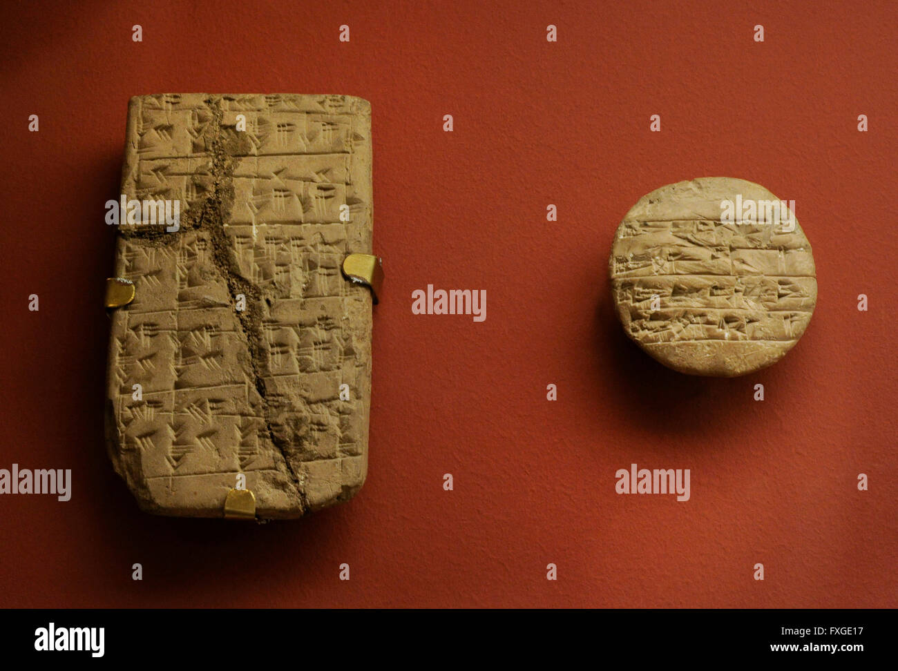 Sumer. Mesopotamia. Right: School tablet. Sumerian words. The exercise was probably corrected by a teacher. Left: School mathematical tablet. The state Hermitage Museum. Saint Petersburg. Russia. Stock Photo